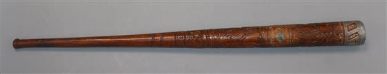 An Australian carved wood staff or whip handle c.1890-1910, decorated with an emu and kangaroo, good luck and a cattle rancher length 4